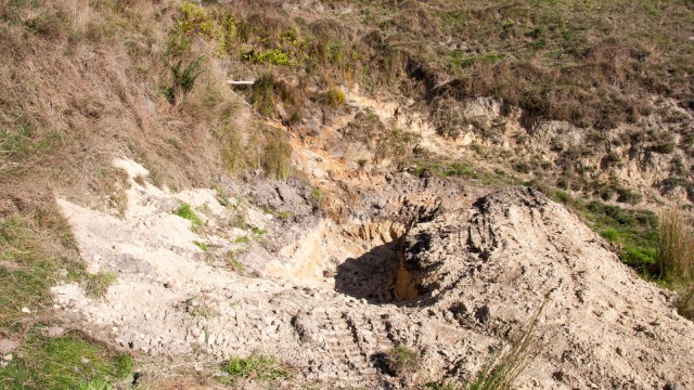 Loads of granite sand for the dam