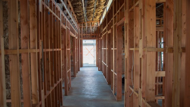 Insulation works start at the roof of the hallway