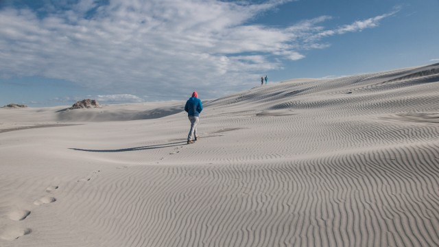 Hiking up a massive sand dune