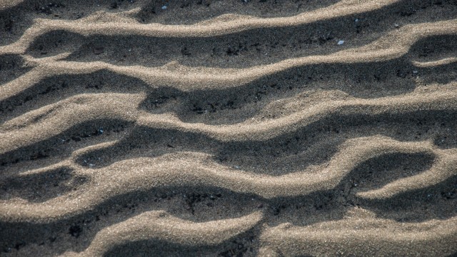 Sometimes you can spot the pattern of a flounder or a stingray in the sand