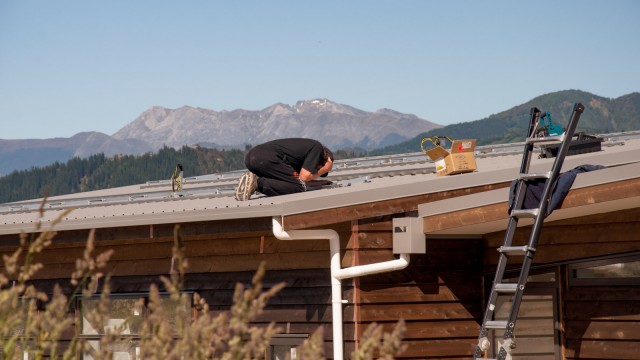 What's he doing? Praying on our roof? :P