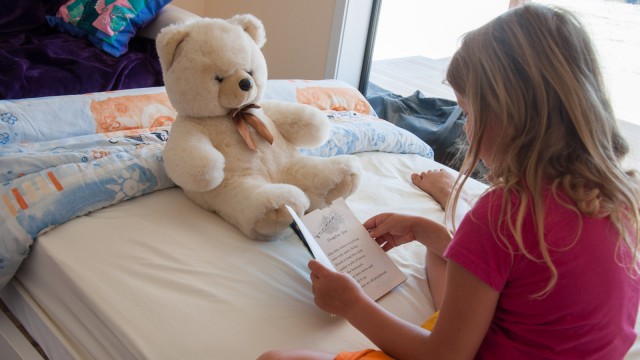 Reading to teddy