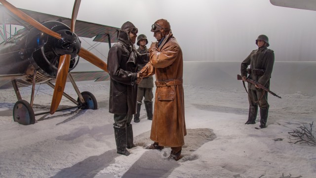 The scenes staged as if it was WWI. Creepy.