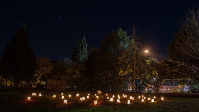 A spiral of lights glows in the dark