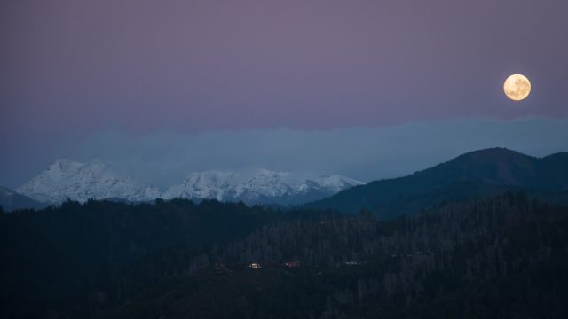 Before dawn full moon over Mt Arthur