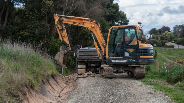 Improving the water channel along the driveway